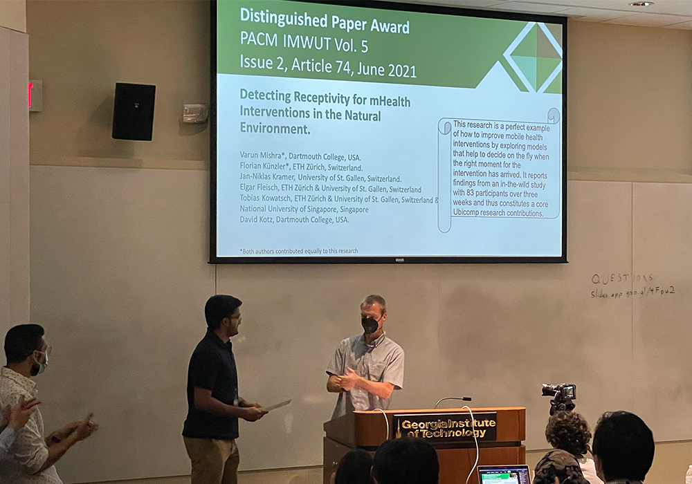 Varun receiving the Distinguished Paper Award at UbiComp 2022.
